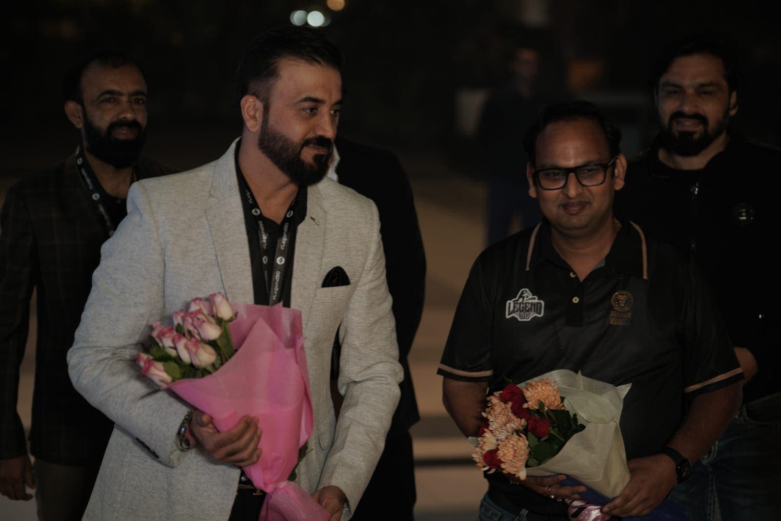 Founders welcomed with flowers at a league event.